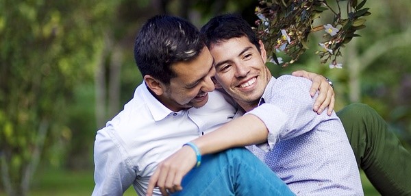 two gay men embracing