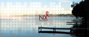 The Northern Exposures conference logo sits on a photo of a lake in Northern Ontario.
