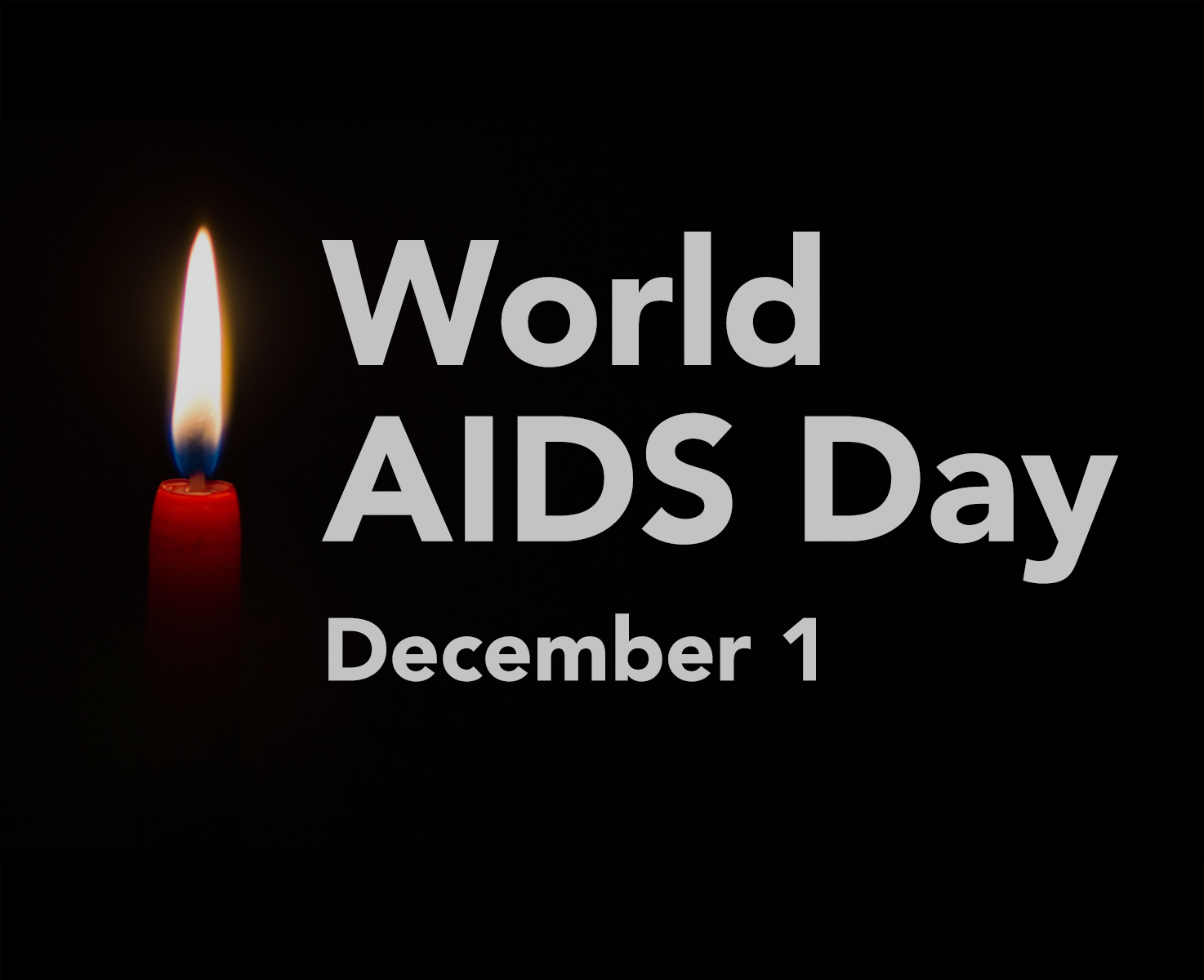 Single red candle on a black background with the words "World AIDS Day December 1" in large white letters.