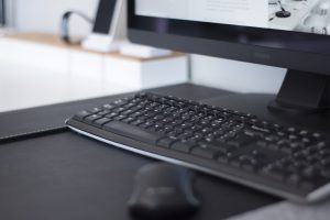 Image of a computer monitor, keyboard, and mouse