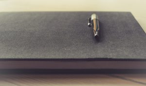 Image of pen and notebook