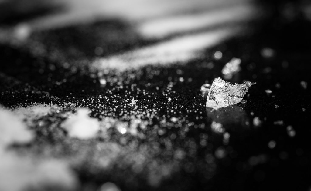 Close-up black-and-white photography of crystal methamphetamine